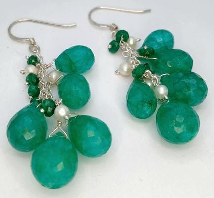 A Pair of Emerald Cocktail Drop Earrings. Each hav
