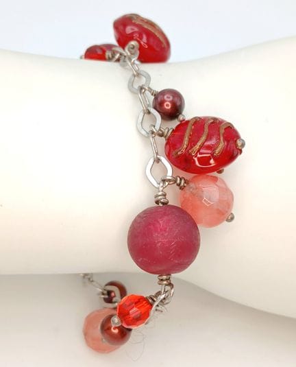 A 925 silver stone set link fashion bracelet. Tota