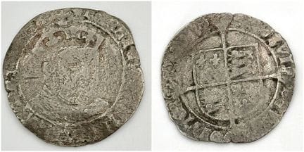 Una moneda de plata de un groat de Enrique VIII, a