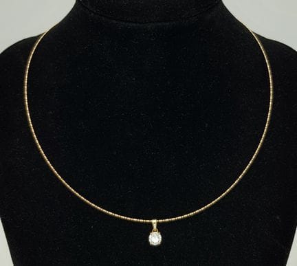 Un magnifique collier ras-du-cou en or jaune 18 ca