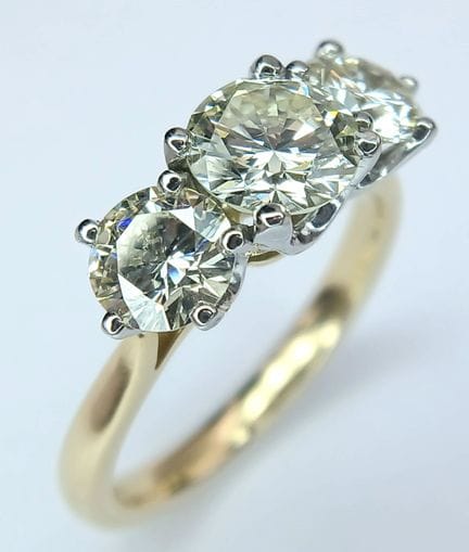 Anillo «trilogía» de diamantes en oro amarillo de 