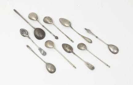 SIX TEA SPOONS by K. FABERGE
Various designs. We a
