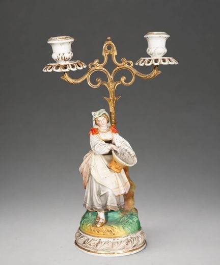 Porcelain candlestick with figure – German School 