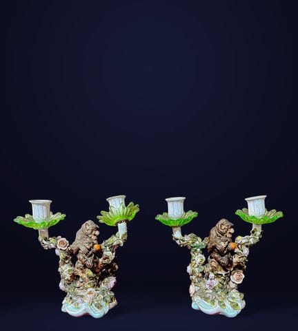 Pair of porcelain candlesticks with chimpanzees, C