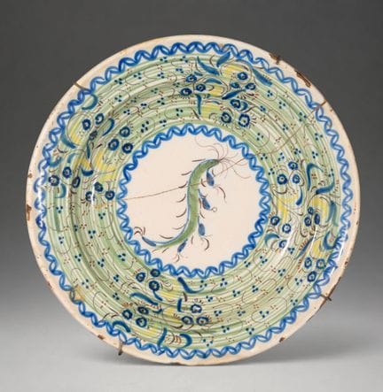 MANISES CERAMICS - Assiette avec décor végétal pol