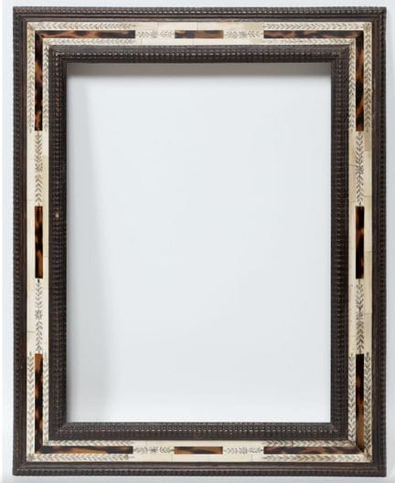 Decorative frame made of pyrographed bone, imitati