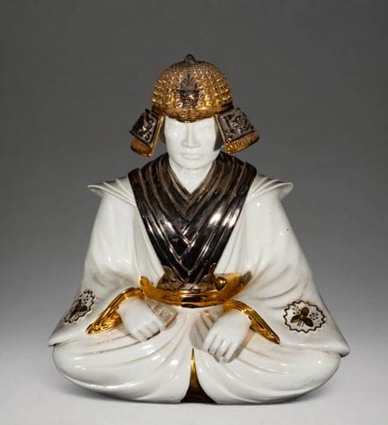Horloge en porcelaine représentant un samouraï – É