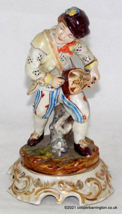 Antica statuetta continentale di suonatore di liut