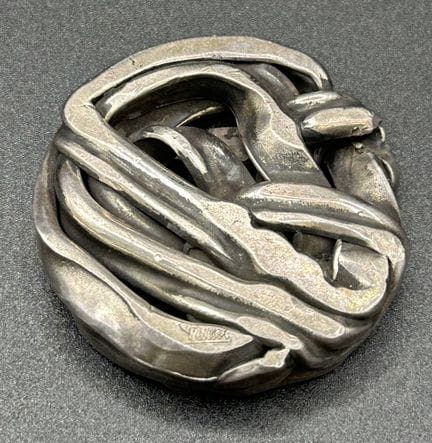 塞萨尔·巴尔达奇尼（1921-1998）与帕斯卡尔·莫拉比托
镀银青铜圆形浮雕。署名“帕斯卡尔”
高