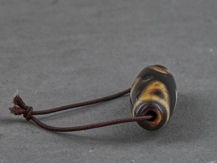 VAJRA-DZI-PERLE MIT SECHS AUGEN, TIBET

Maße: Höhe