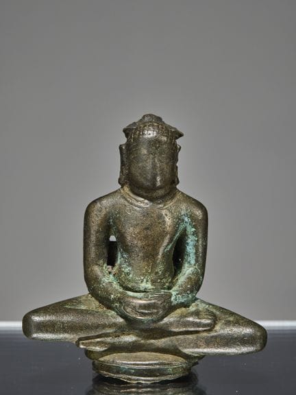 PICCOLA STATUETTA JAINISTA IN BRONZO, INDIA, XII S