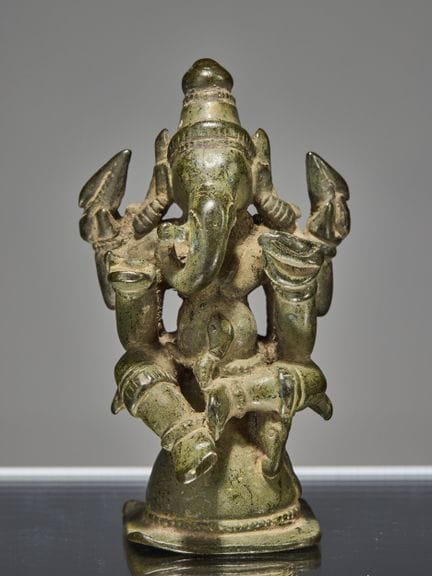 GANESHA ASSIS EN BRONZE, INDE, XVIe SIÈCLE

Dimens