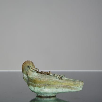 LAMPADA A OLIO ROMANA IN BRONZO

Dimensioni: Altez