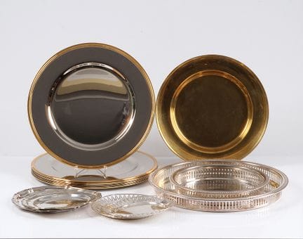 10 place plates. Polished stainless steel with bra