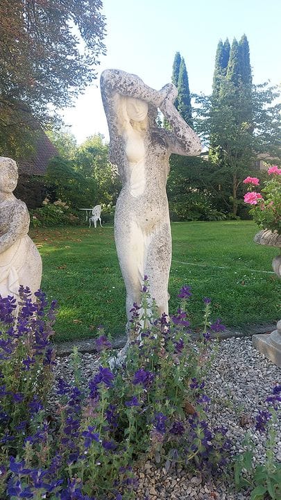 Large garden statue. Cast stone. 20th century. Fig