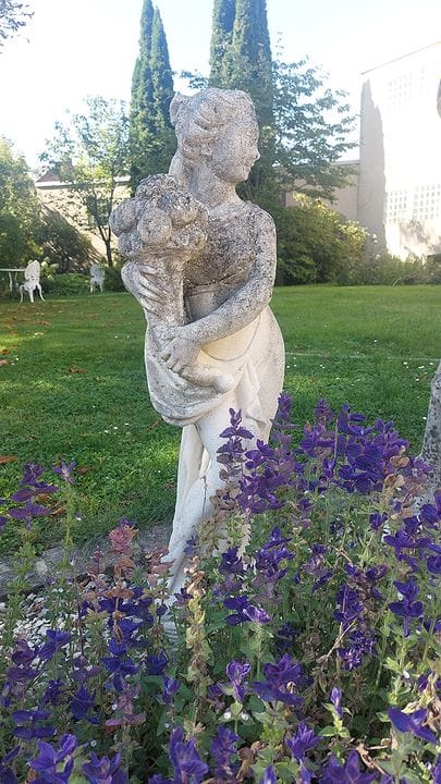 Garden statue. Cast stone. 20th century. Depiction