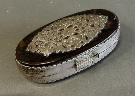 Tortoiseshell boxes with openwork silver mounts
17