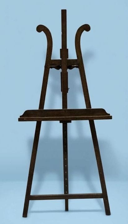 Un chevalet en bois naturel formant une lyre
Haute