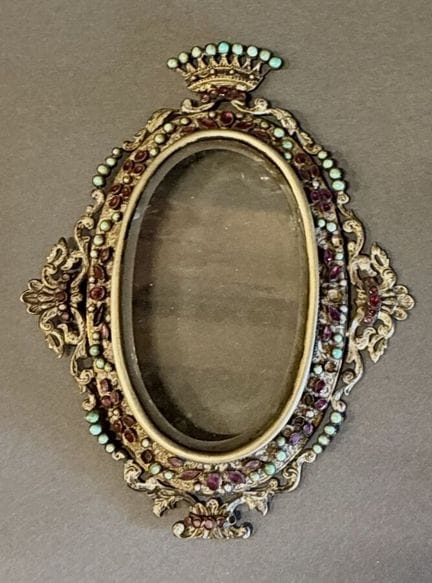Part of a reliquary with cabochons, topped by a cr