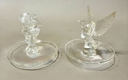 Pair of glass ring sizers featuring a ram or a dov
