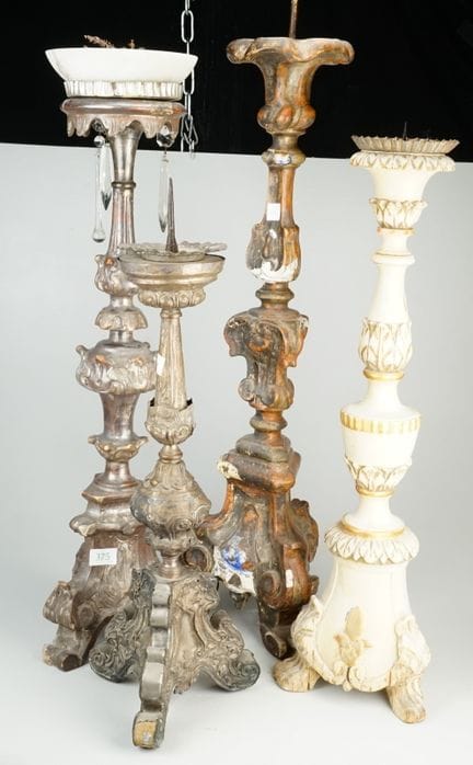 Collezione di quattro candelieri sacri barocchi: i
