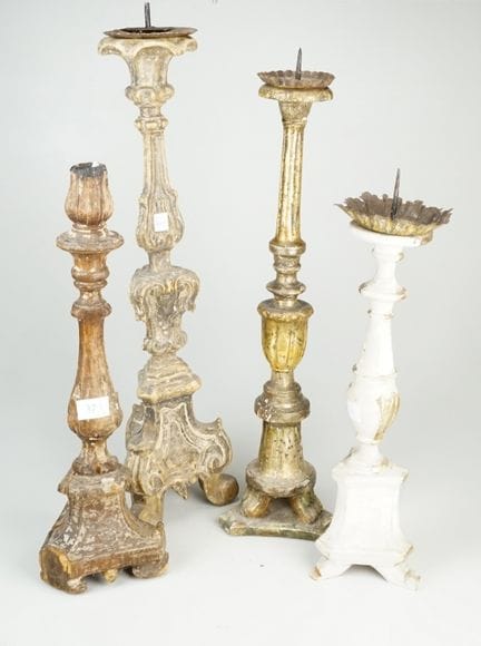 Collezione di quattro candelieri sacri barocchi: i