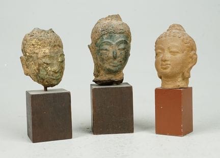 3+1 antiche teste di Buddha khmer, per lo più del 