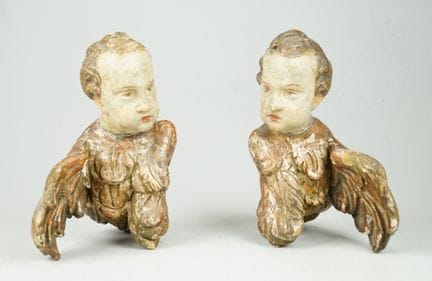 2 teste di cherubino, 1750 circa. Legno intagliato