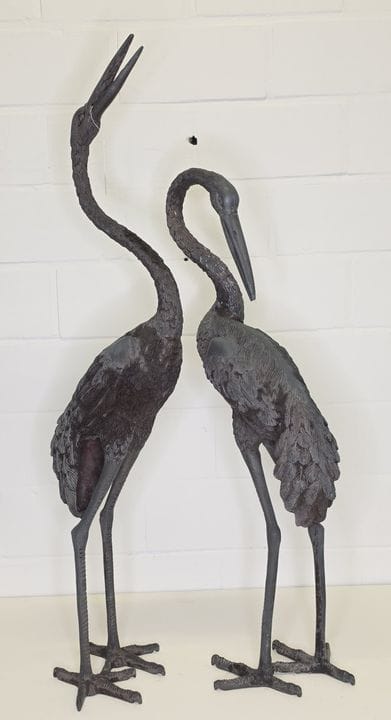 Coppia di sculture decorative raffiguranti gru. Br