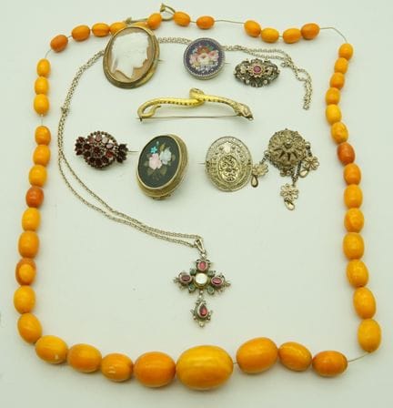 Bella collezione di spille antiche in argento, 10 