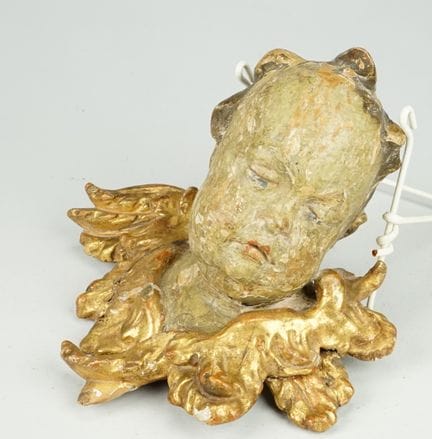 Testa di putto, 1730 circa. Legno intagliato, vern
