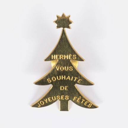 HERMES
Gold-plated metal Christmas tree-shaped pin