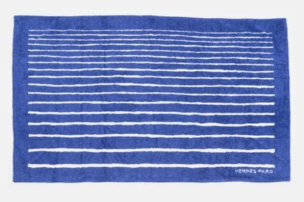 HERMES
Blue cotton towel with white stripes, "Sous