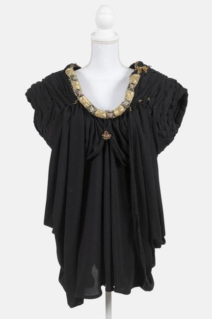 REINHARD LUTHIER
Black chiffon mini dress with dra