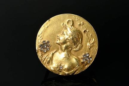 Broche Art nouveau en or jaune 750 présentant un p