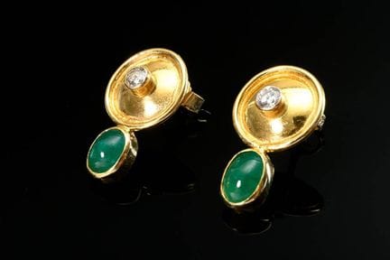 Paire de boucles d'oreilles convexes en or jaune 7