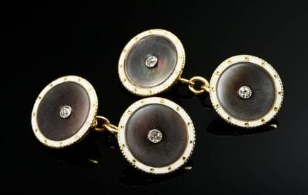 Paire de boutons de manchettes en or jaune 750 ser