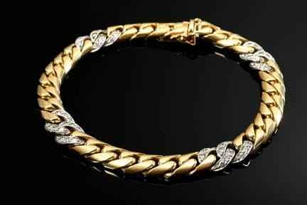 Bracelet-chaîne massif en or jaune et blanc 750 sa