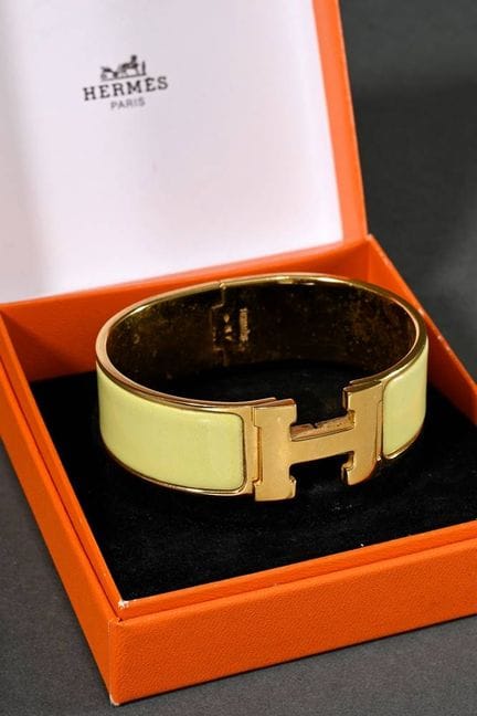 Bracelet Hermès « Clic Clac H », métal doré et éma