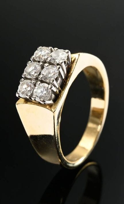 Bague en or jaune 750 sertie de 6 brillants (total