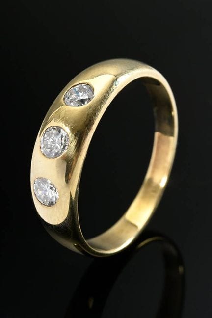 Bague anneau en or jaune 585 sertie de 3 brillants