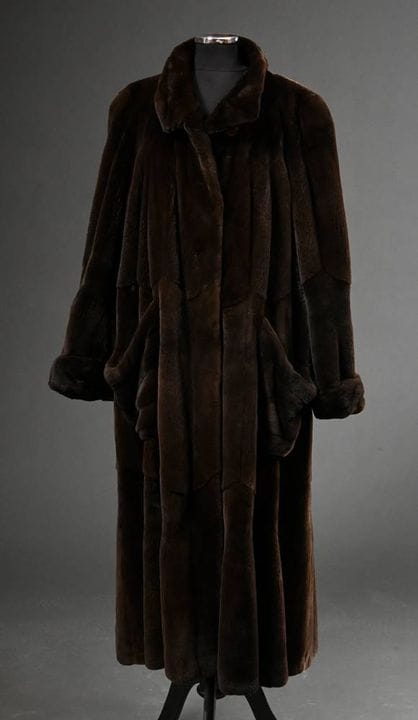 Long manteau en vison effiloché avec poches plaqué