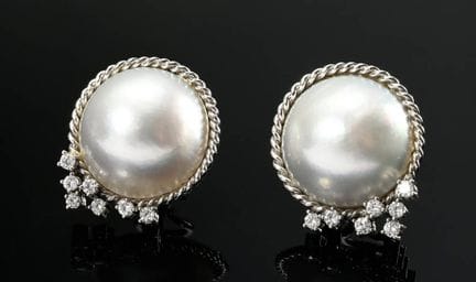 Paire de boucles d'oreilles à clip en or blanc 750