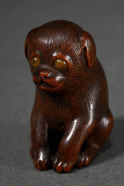 Netsuke raffiné en buis « Chiot triste » avec des 