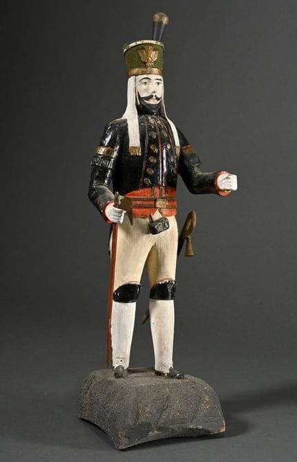 Mineur illuminé en uniforme de parade, muni d'une 