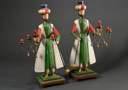 2 figurines de Turcs illuminées avec des araignées