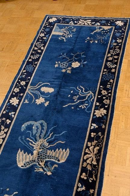 Galerie de Pékin avec une bordure florale entouran