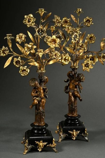 Coppia di girandole decorative in stile storicista