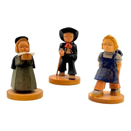 Tre statuine in legno dei Monti Metalliferi, dipin