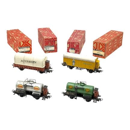 Märklin four goods wagons: BP, Esso, Jamaica and t